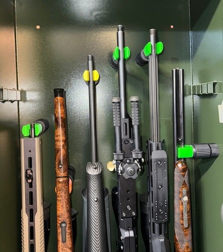 Magnetic rifle holder for - rifle,